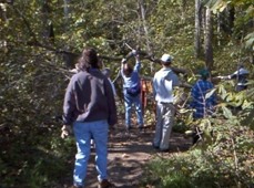 photo of volunteers maintaining trail